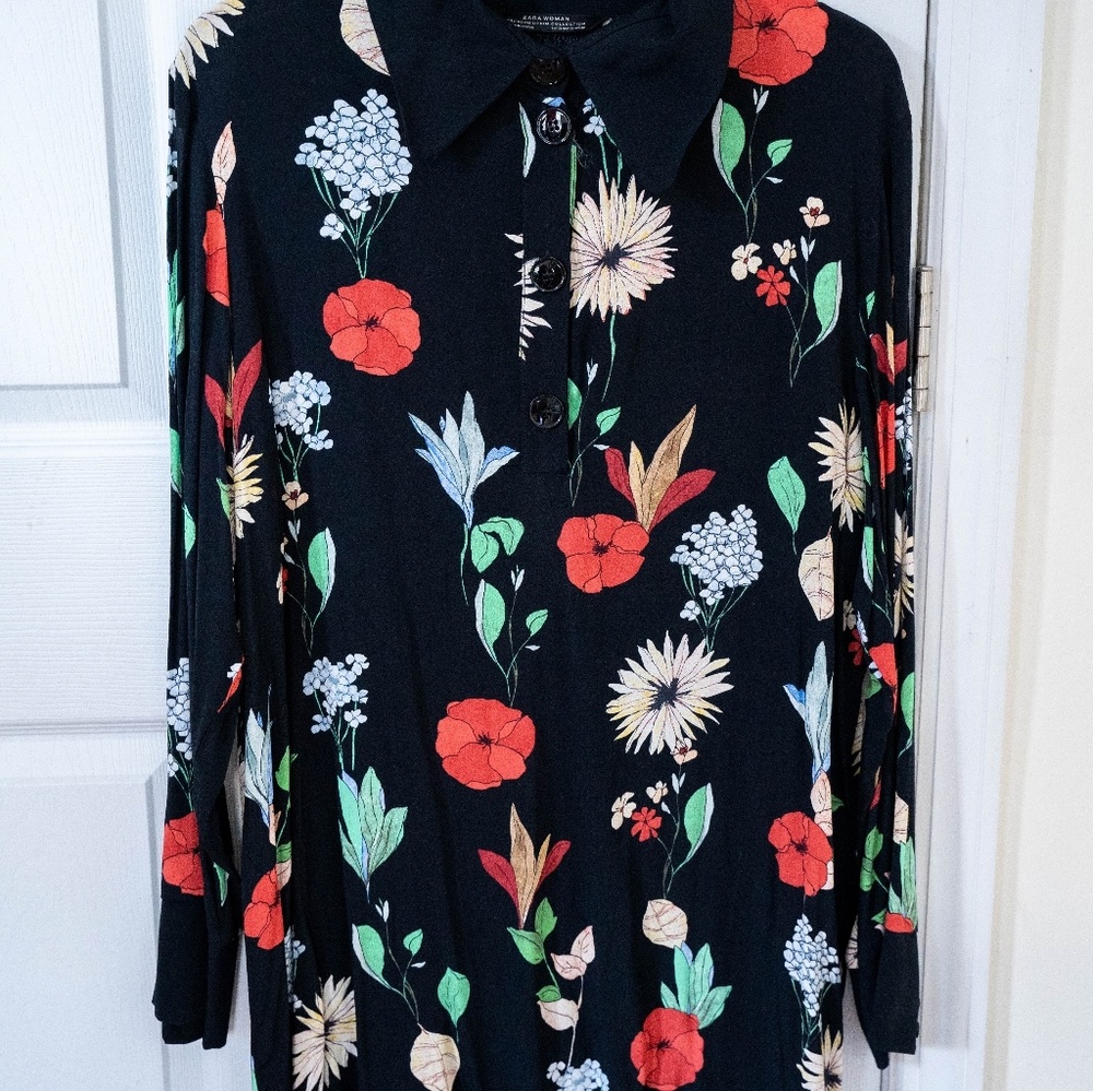 Woman's black dress with flower pattern